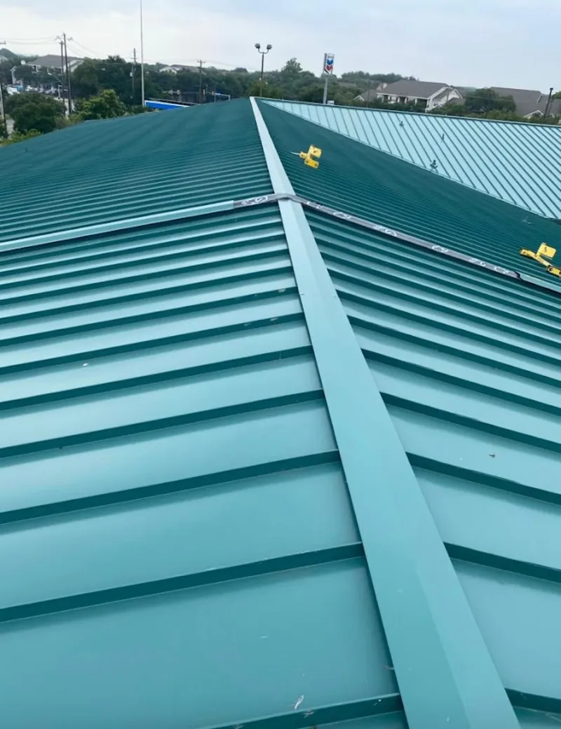 Green commercial metal roof ridge and valley for Metal Roof Repair in Swampscott
